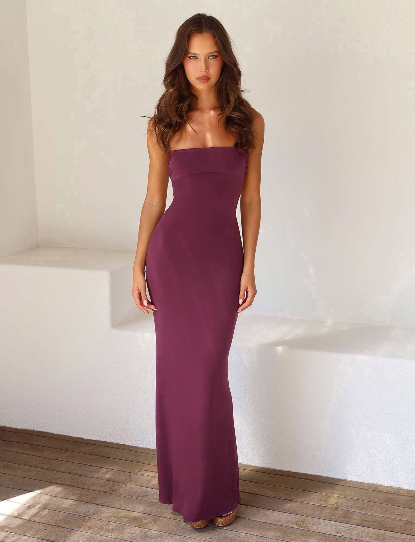 Sexy, form-fitting backless halter solid color dress